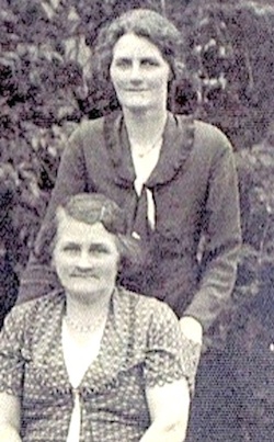Laura Yarrow (née Dewsbury) standing with sister Ellen in 1925.