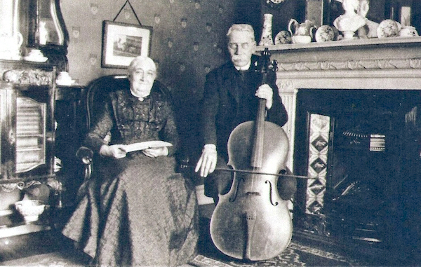 William Yarrow playing cello alongside his wife Emma, at home in Liverpool. Photo: Andrew Martin.