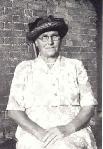 Louisa Pope (née Barber, formerly Hopkin) outside her home at Witchford, 1953.