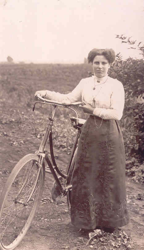 Ethel May Martin with her bicycle in Downham Fen